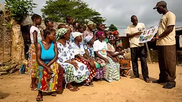 women and men learning about child labour
